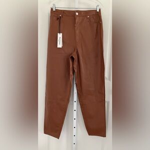 Juicy Couture Faux Leather Pants.
Size 30.
New With Tags.